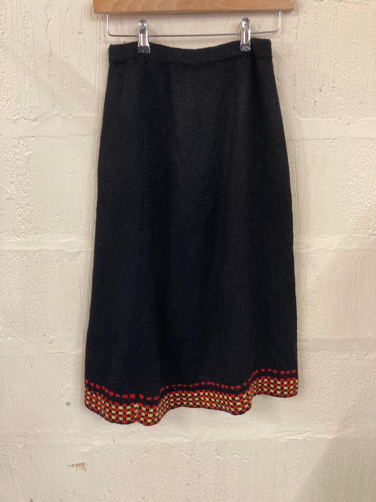 Handmade Black Knitted Skirt with Red and Yellow Pattern at Hem Size 6-8